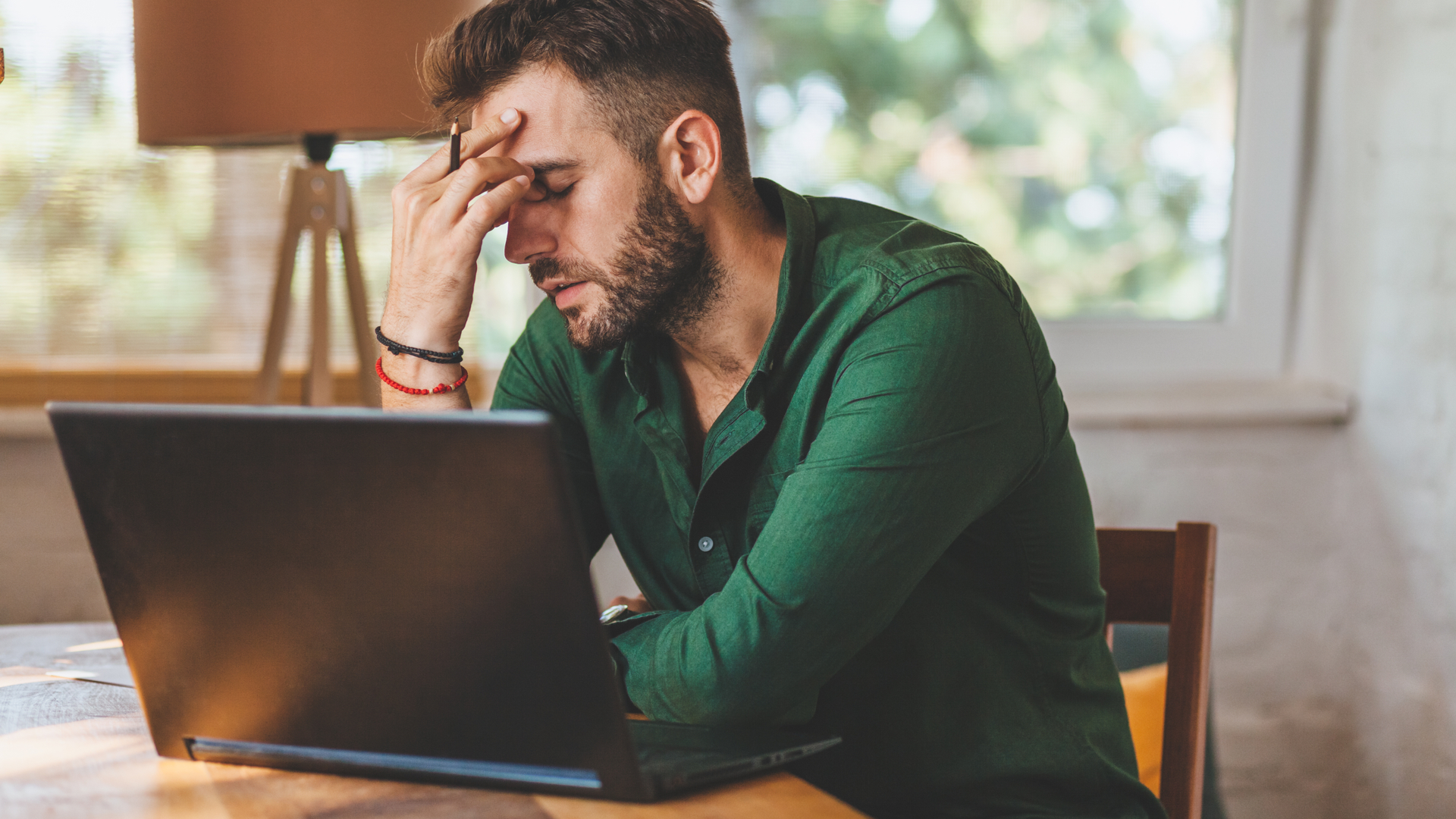 Man having Windows 11 problems with his laptop