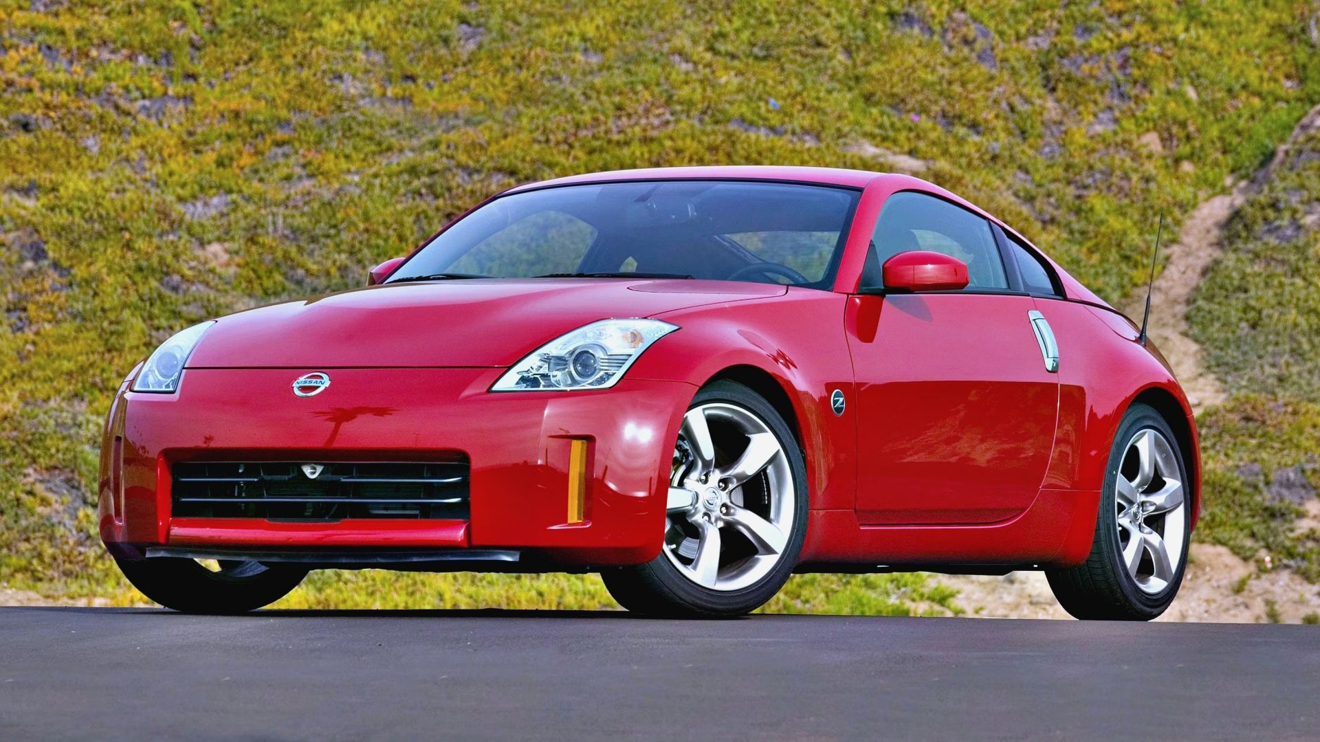 Red 2007 Nissan 350Z parked outdoors