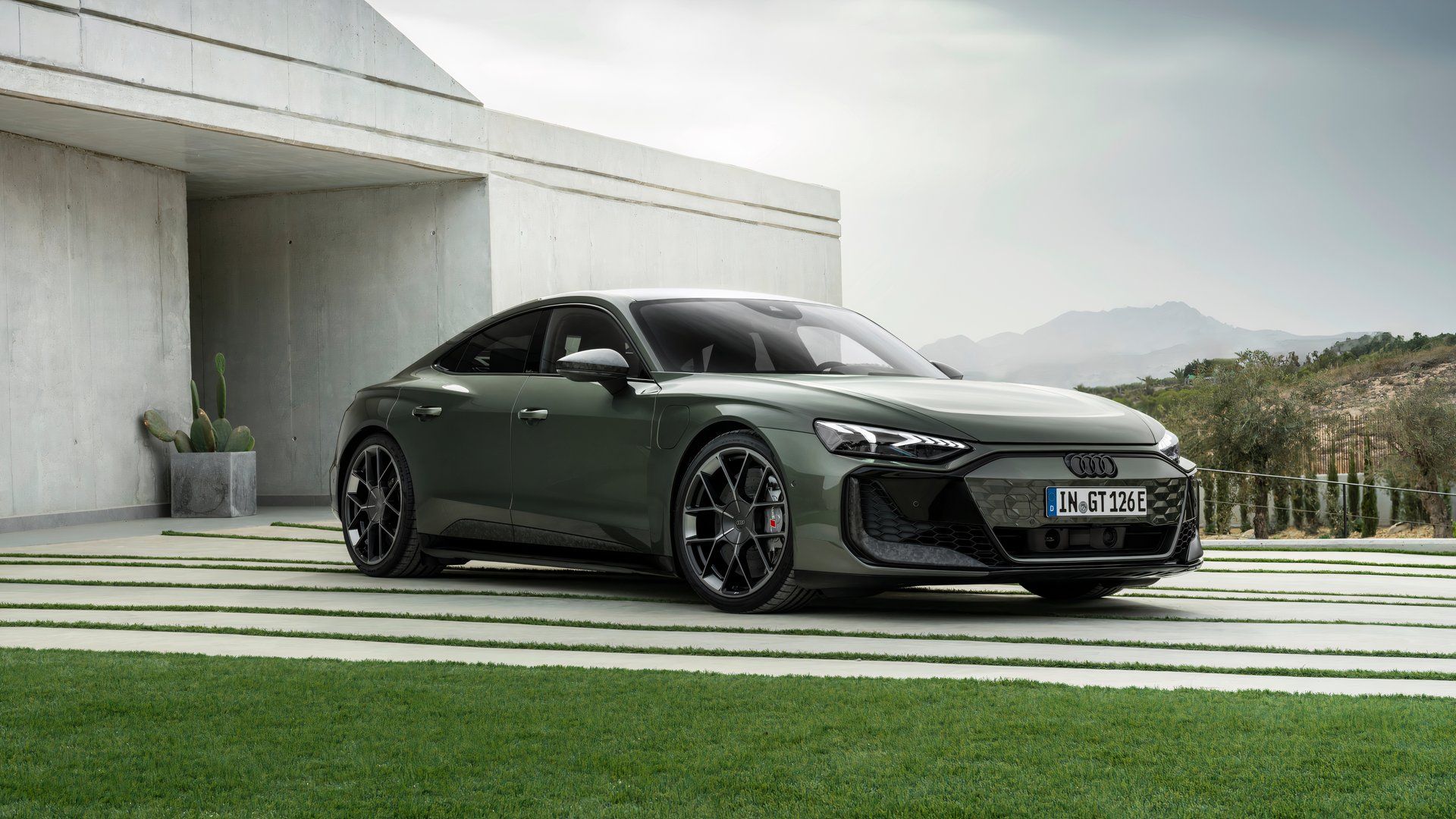 Front three-quarters shot of a Green Audi RS e-Tron GT Performance