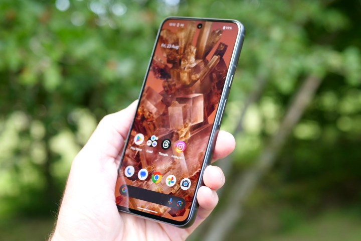 A person holding the Google Pixel 8.