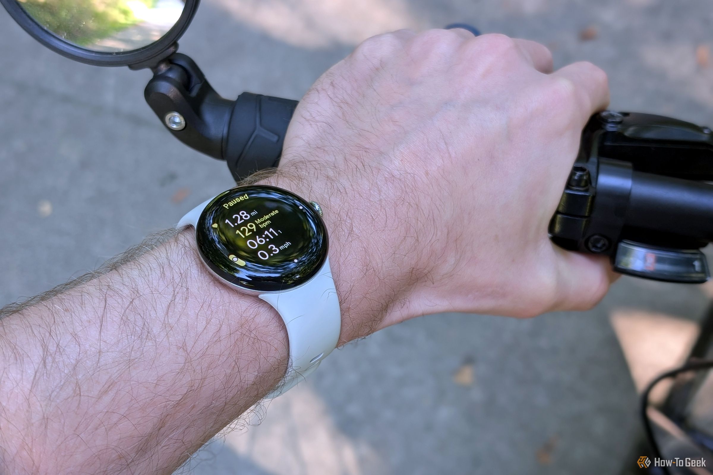 Wearing a Pixel Watch 3 while biking.