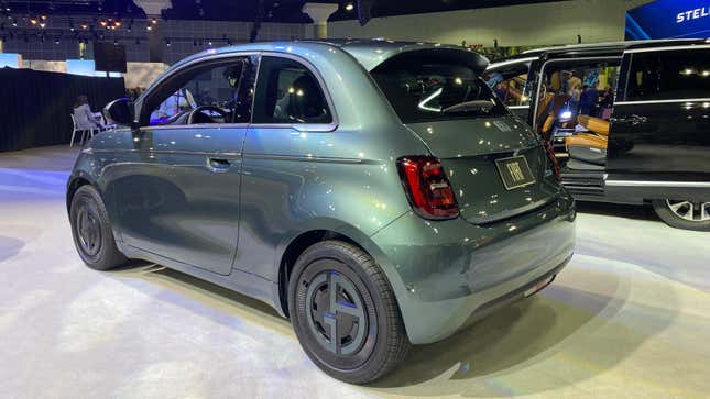 a rear three quarters shot of the green fiat 500e GA