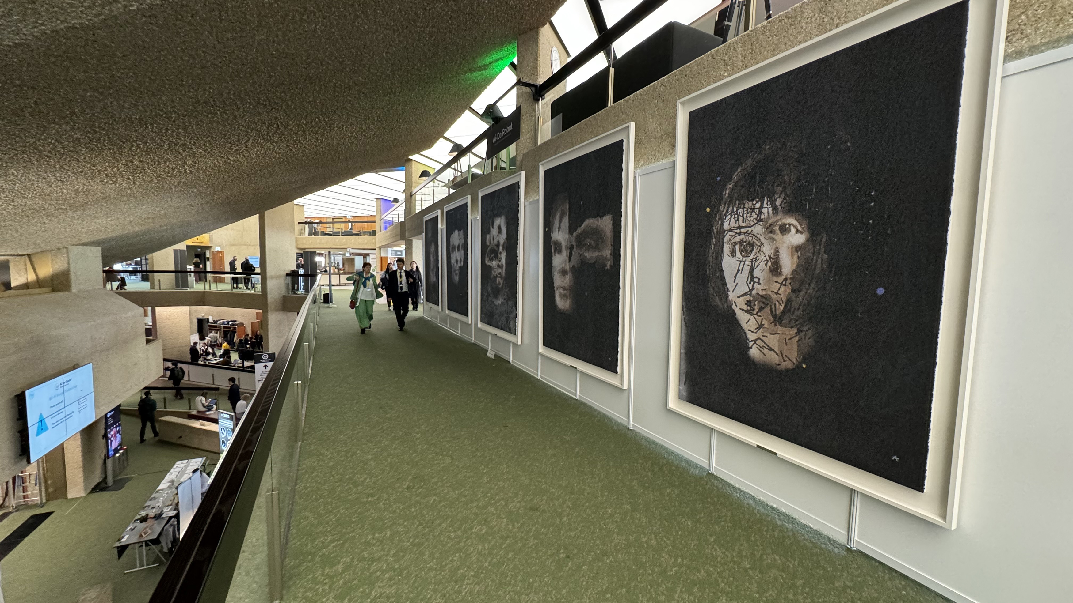 A gallery at the United Nations showing the Ai-Da robot's 'AI God' painting of Alan Turing