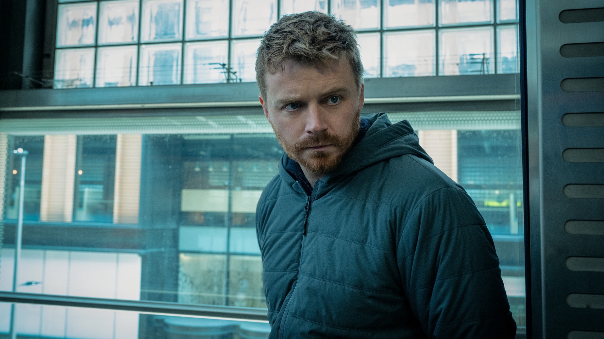 Jack Lowden looks pensively in Slow Horses