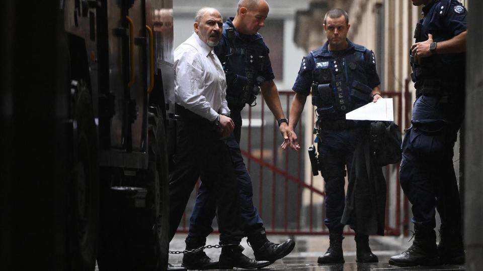 Tony Mokbel (left) arrives at the Supreme Court