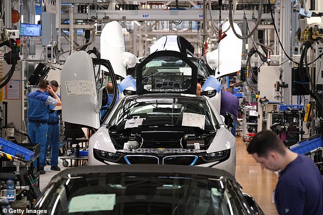 Germany is home to some of the world's biggest car firms including Mercedes-Benz, Audi and BMW (pictured: the BMW plant in Leipzig)