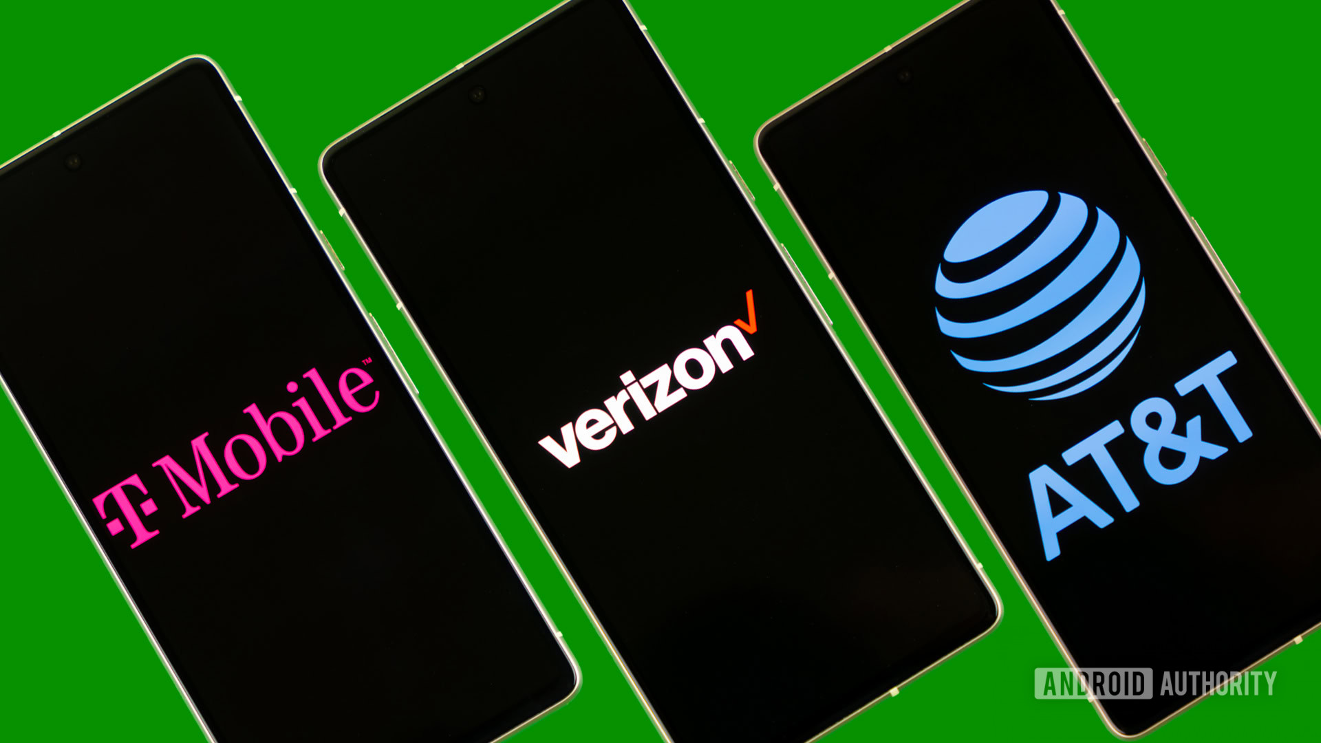 Phones showing Verizon, AT&T, and T Mobile logos stock photo (3)