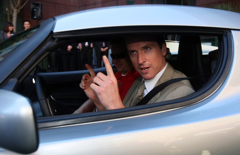 Current California Governor and then-San Francisco Mayor Gavin Newsom test drives a Tesla Roadster electric car in San Francisco, Calif. on Wednesday, August 29, 2007.