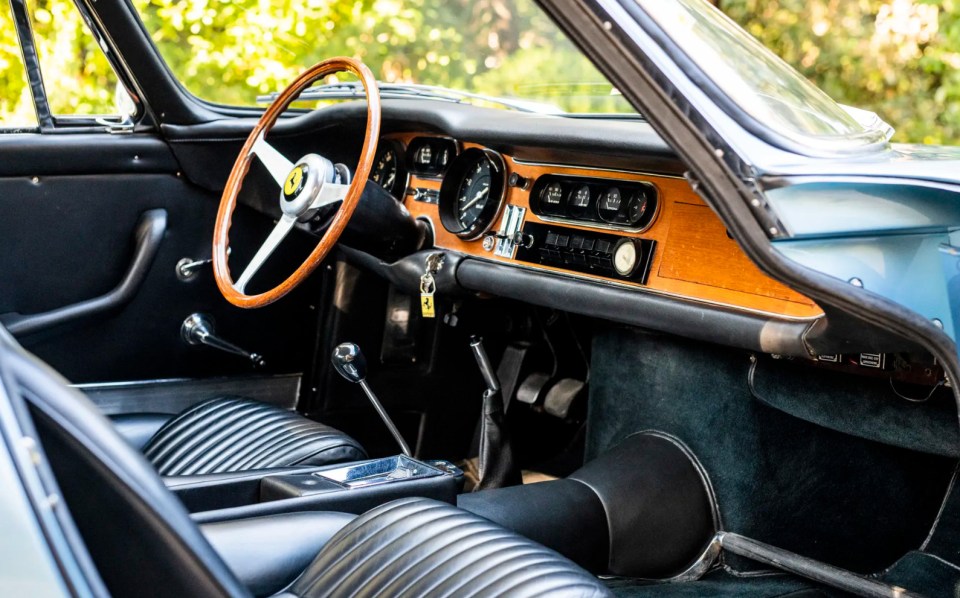 The motor comes with a sleek wooden panel interior and the iconic Ferrari badge on the wheel