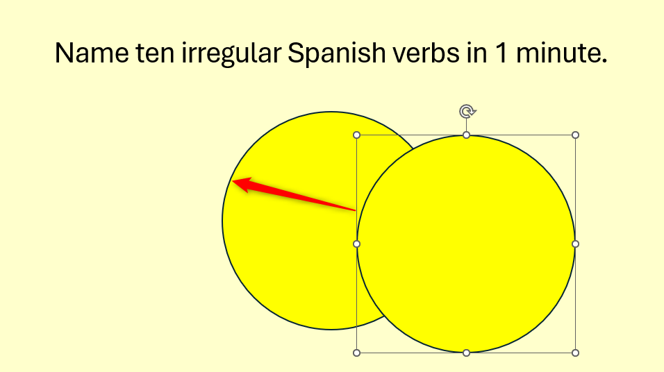 Two circles in PowerPoint, with one being moved to entirely cover the other.