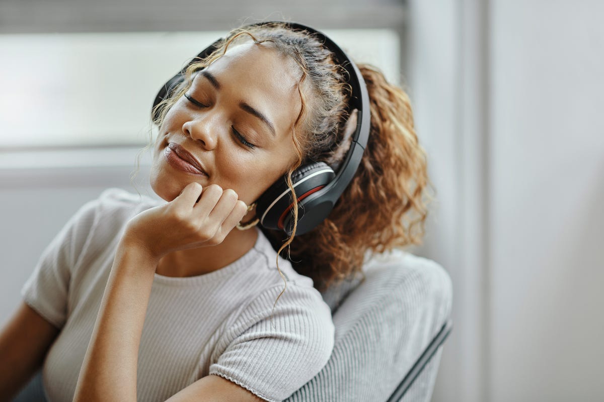 Smiling woman with headphones on