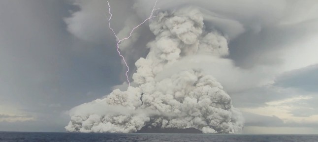 An eruption occurs at the underwater volcano Hunga Tonga-Hunga Ha'apai off Tonga, January 14, 2022 in this screen grab obtained from a social media video. Video recorded January 14, 2022. Tonga Geological Services/via REUTERS THIS IMAGE HAS BEEN SUPPLIED BY A THIRD PARTY. MANDATORY CREDIT. NO RESALES. NO ARCHIVES.