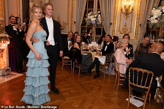 Pictured: Apple Martin with her date Leo Cosima Henckel von Donnersmarck at the Debutante Ball in Paris on Saturday