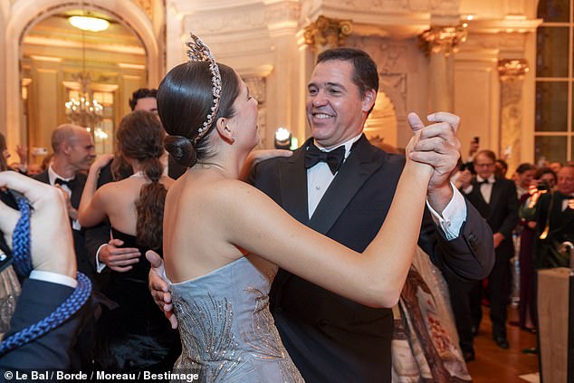 Pictured: Princess Eugenie de Bourbon, 17, dancing with her father Prince Louis de Bourbon during the ball