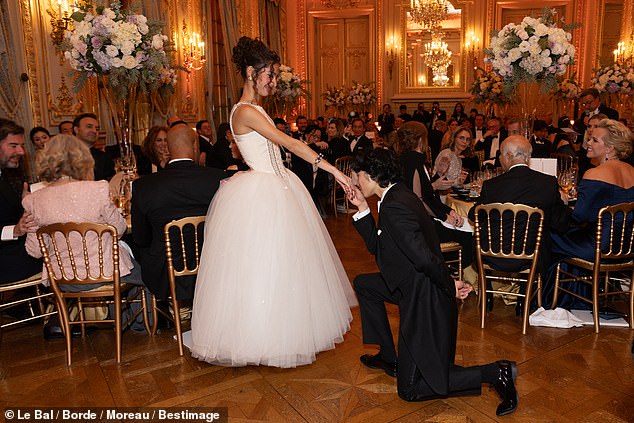 Pictured: Debutante Mina Muniz Tschape (wearing Gaultier Paris) and her date Zhining Zhao at the ball