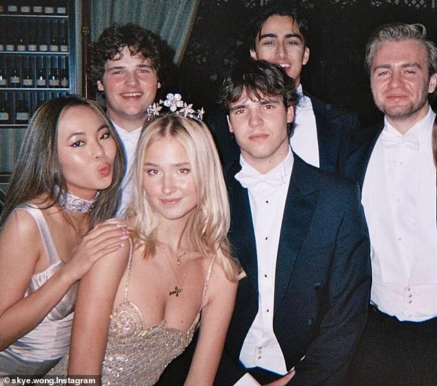 For this year's ball, Wong (left) was dressed in a champagne-colored silky dress with ruched detailing as well as a matching choker