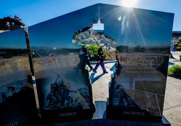 The National Cemetery All Forces Color Guard seen through the...