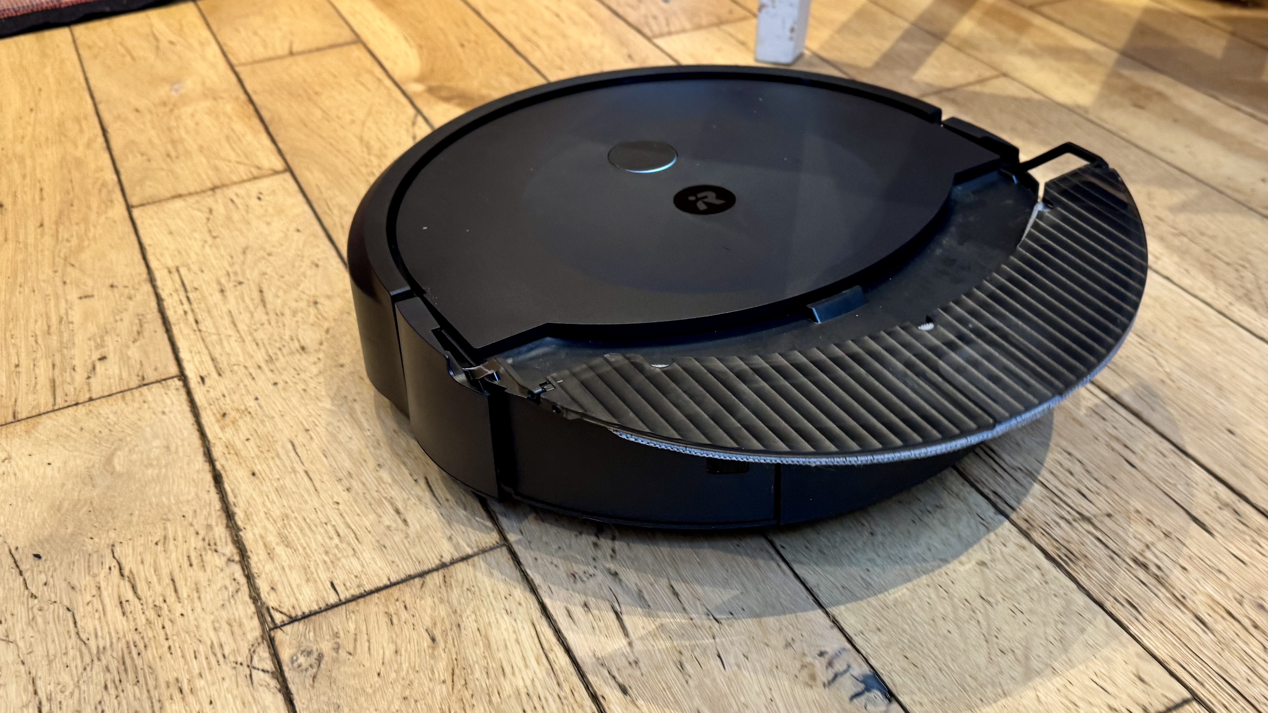 Mop pad on iRobot Roomba Combo 10 Max retracting to sit on top of the bot