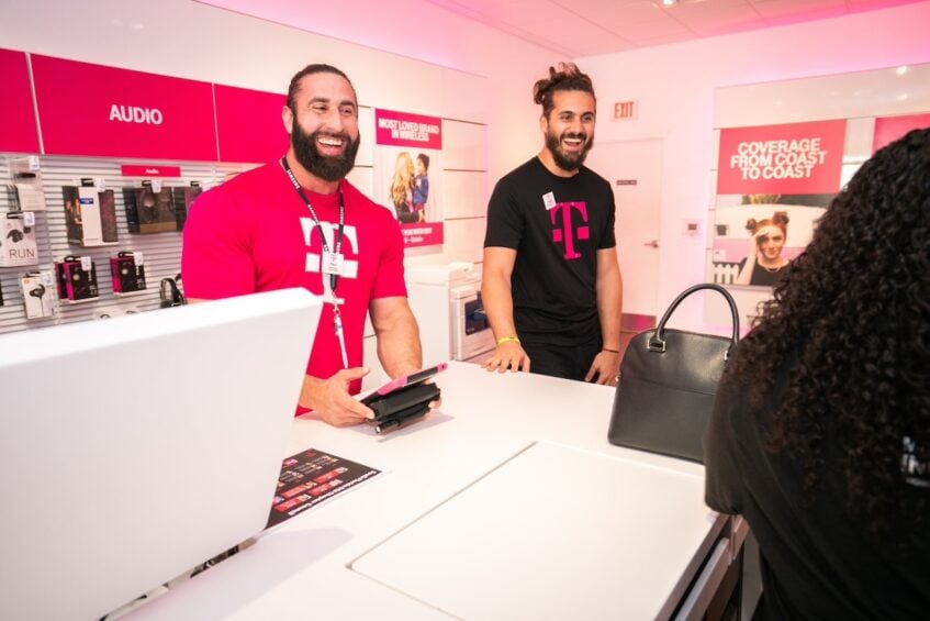 Smiling T-Mobile store employees