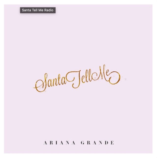 Santa Tell Me and Ariana Grande texts printed on pink background 