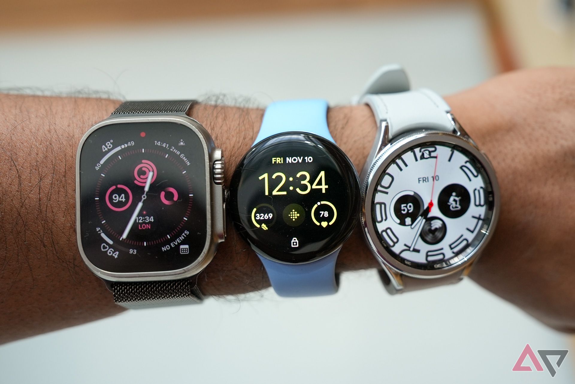 Apple Watch Ultra next to the Pixel Watch 2 and Galaxy Watch 6 Classic