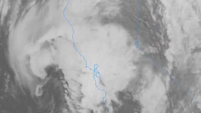 Satellite of powerful storm system impacting the California coastline on Saturday.