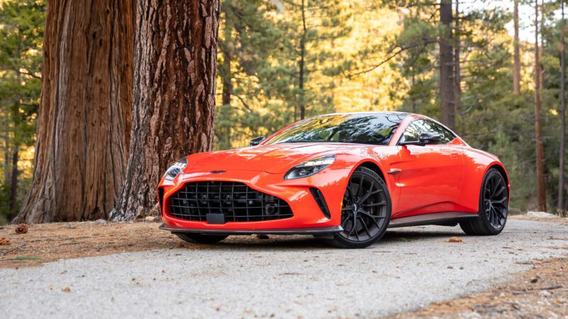 An image of an orange 2025 Aston Martin Vantage parked outdoors.