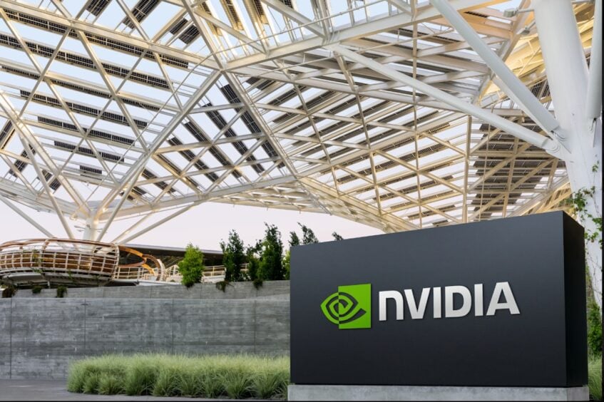 Nvidia logo on black sign in front of park