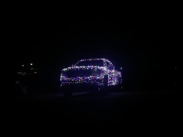 a pickup truck with christmas lights