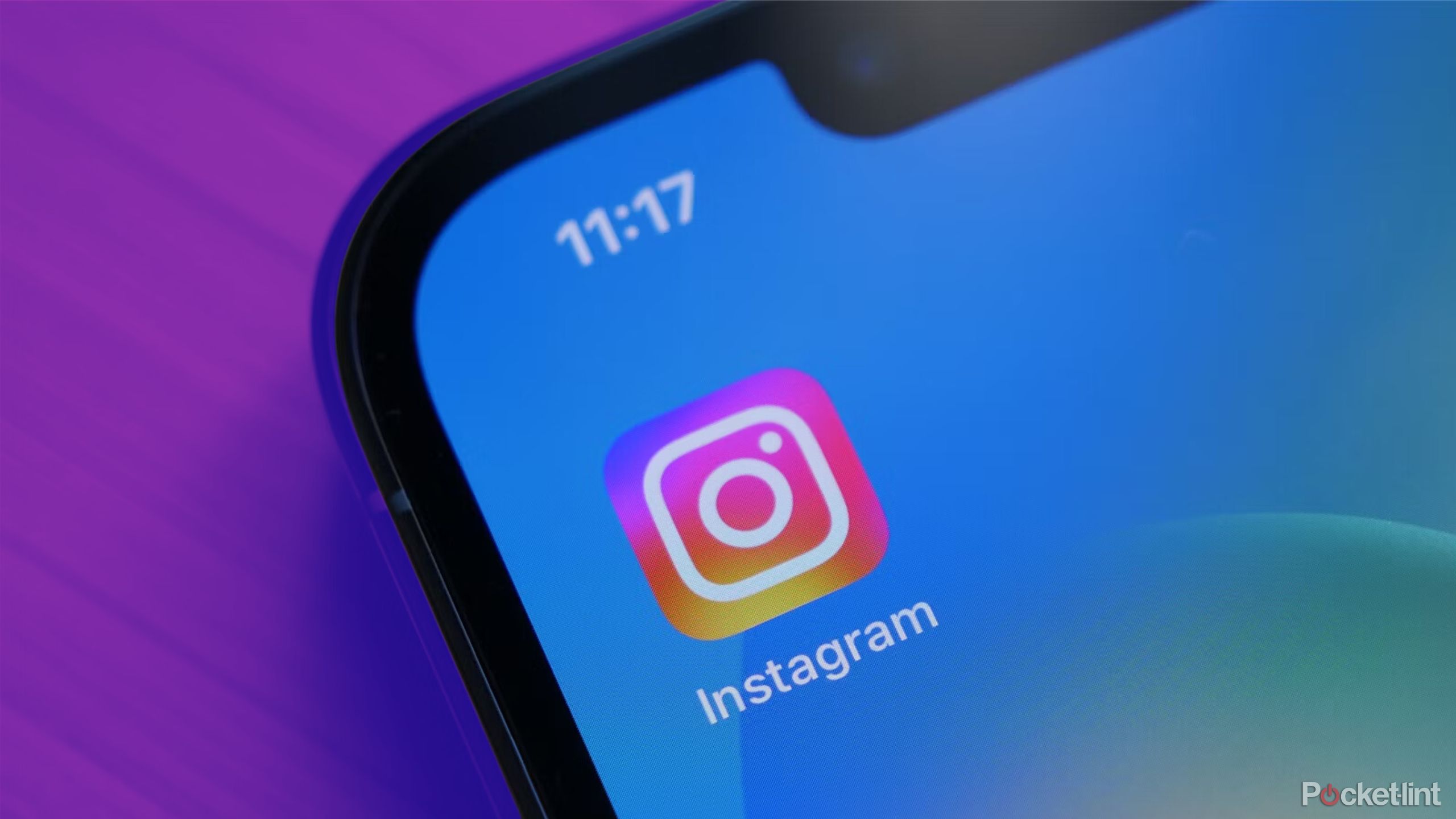 Instagram app on phone on colored background