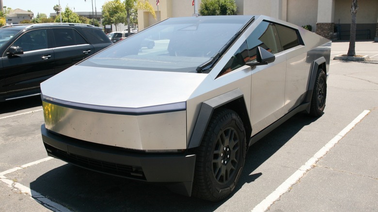 Silver Tesla Cybertruck in parking lot