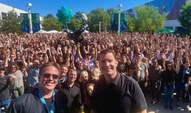 Phil Spencer and Mike Ybarra smiling at Blizzard offices