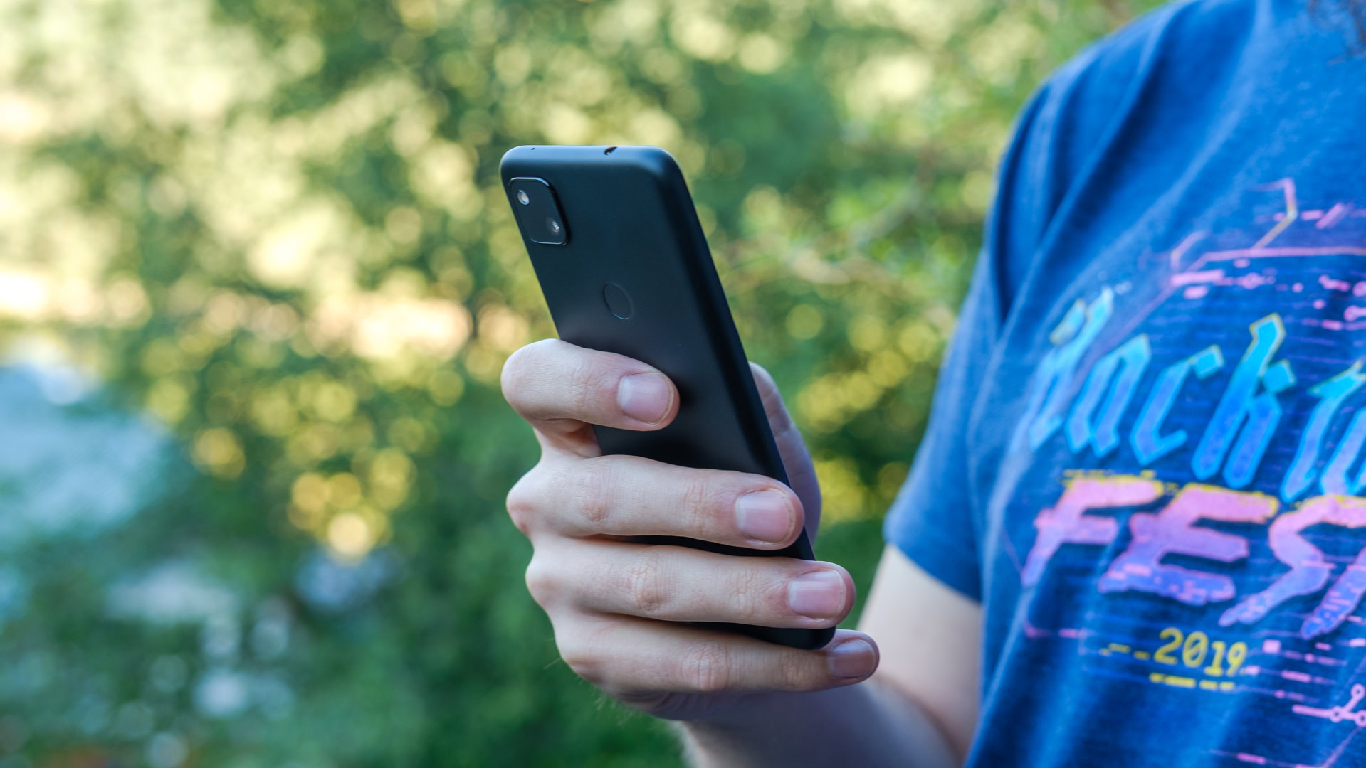 Google Pixel 4a holding phone back