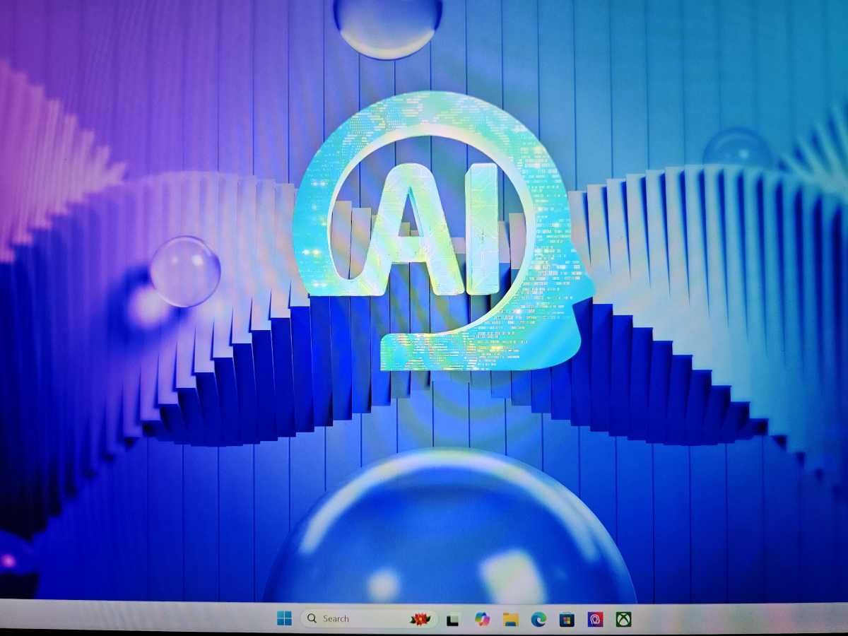 Laptop screen with AI on it