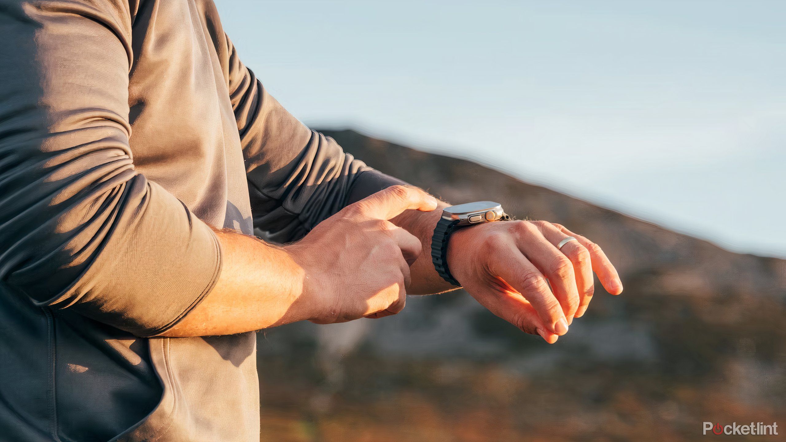 Tapping on an Apple Watch Ultra 2 while wearing it.