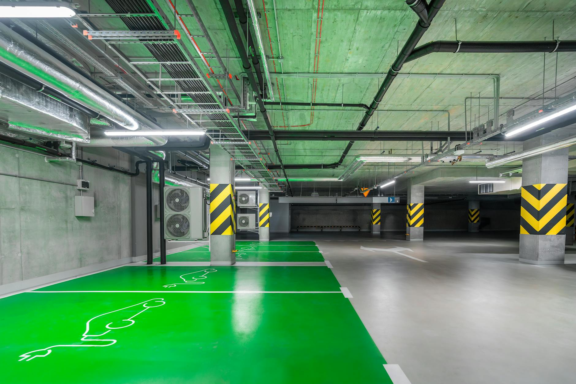 Electric car parking bays. Photo: Jakub Zerdzicki/Pexels.com.