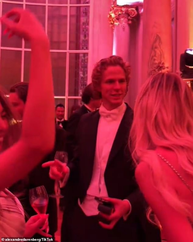 Gwyneth Paltrow and Chris Martin's daughter Apple made her debut into society on the arm of dapper Count Leo Henckel von Donnersmarck at Le Bal des Débutantes in Paris on Saturday