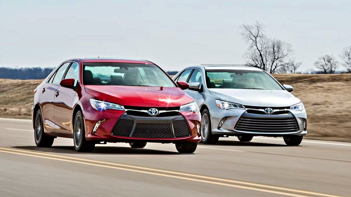 Red and silver 2015 Toyota Camry