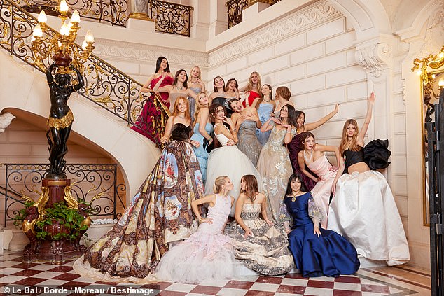 After descending down the hotel's grand marble staircase (pictured), the debutantes took of the room, which was filled with proud parents and noble families