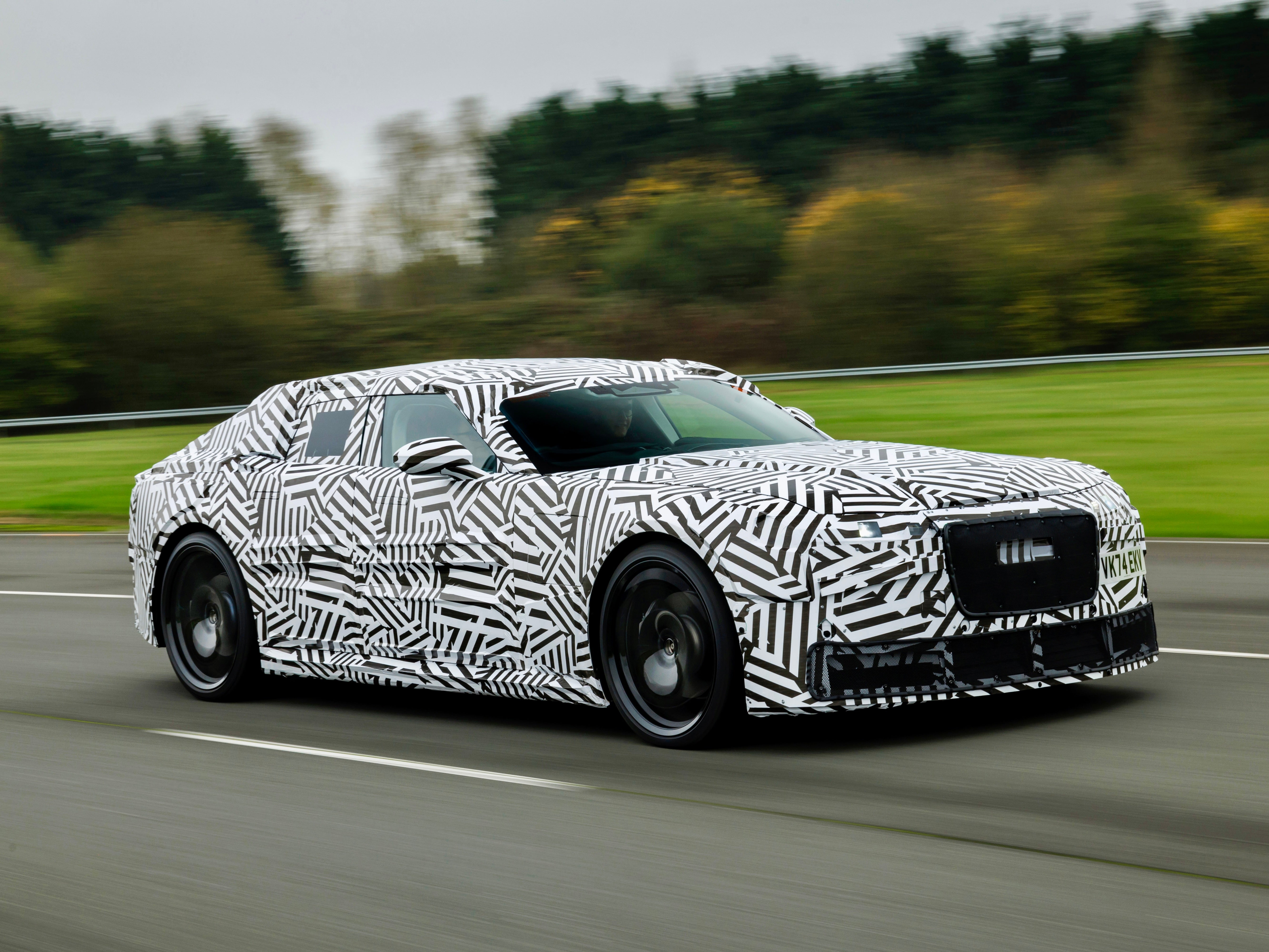 A prototype of the all-electric luxury Jaguar four-door GT caught on test in the UK