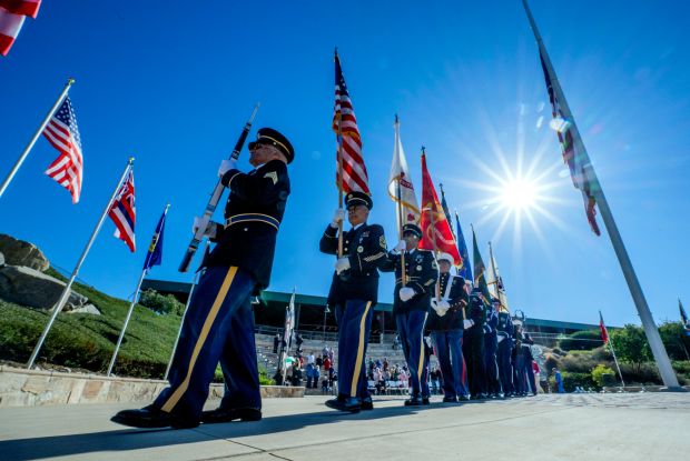 The National Cemetery All Forces Color Guard closes out the...