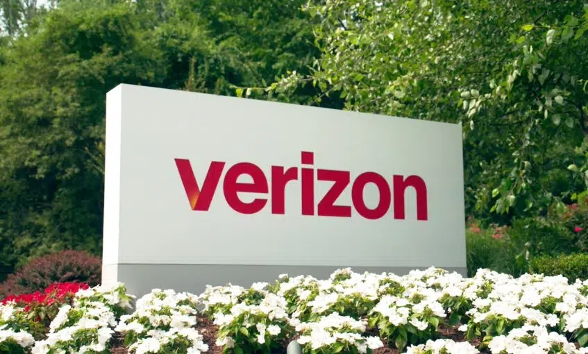 Verizon sign behind flowers