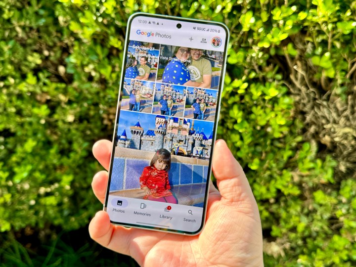 Samsung Galaxy S24 in Marble Gray showing Google Photos.