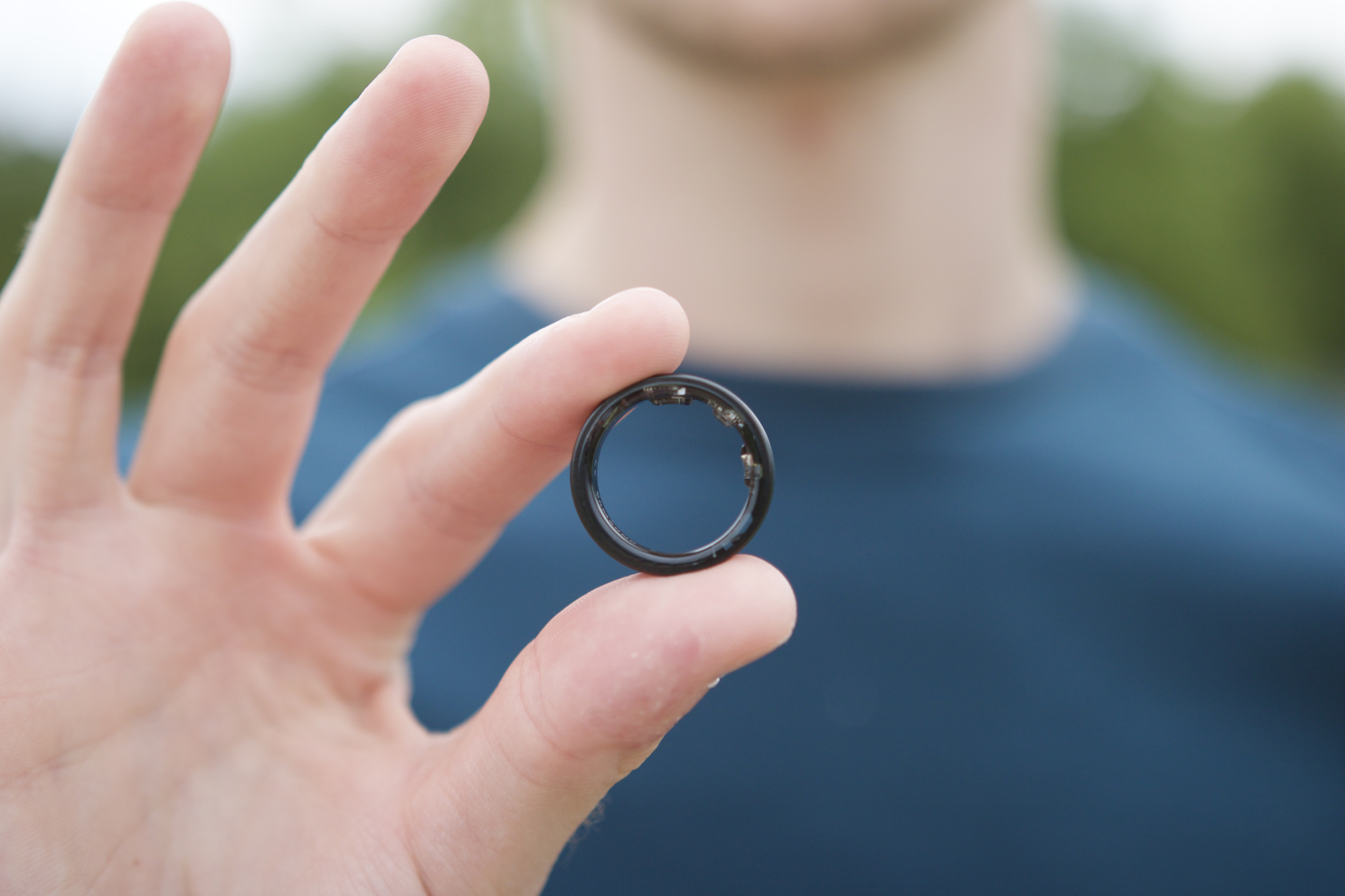 Someone holding the Samsung Galaxy Ring.