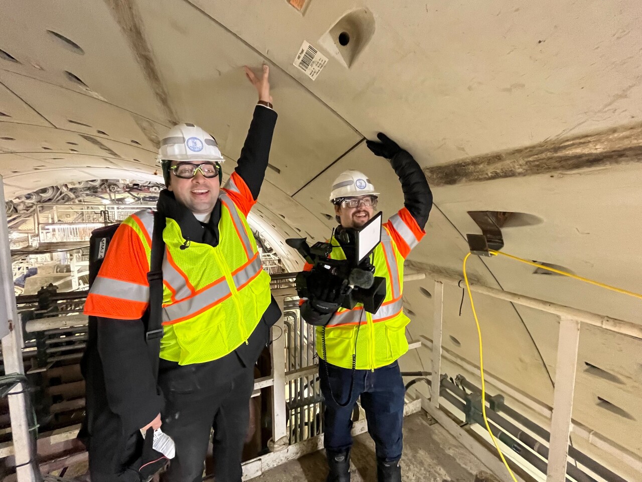 Anthony and Max touch the top of the new HRBT tunnel