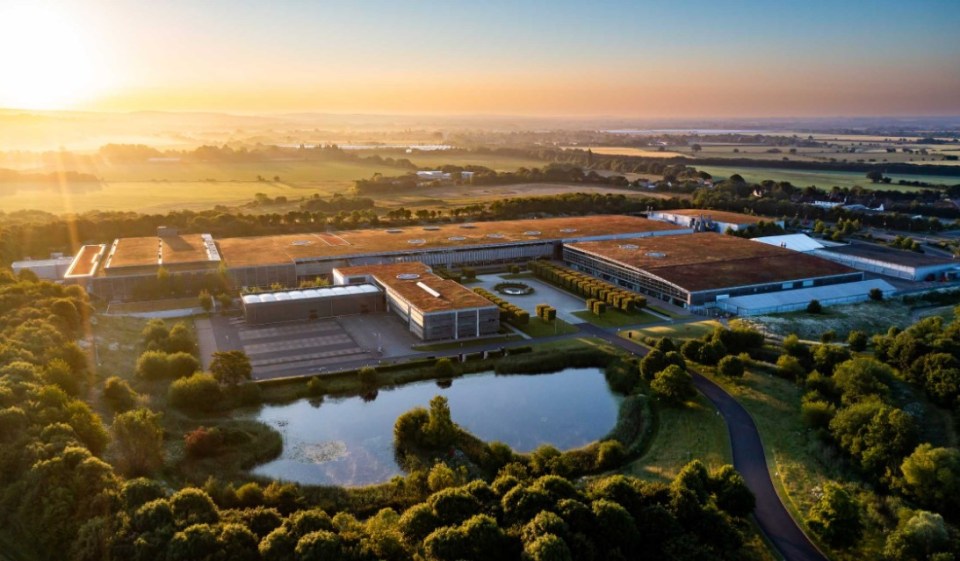 Aerial view of the Rolls-Royce Motor Cars Bespoke facility at sunrise.