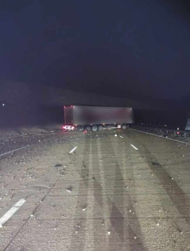 Truck accident on highway at night.