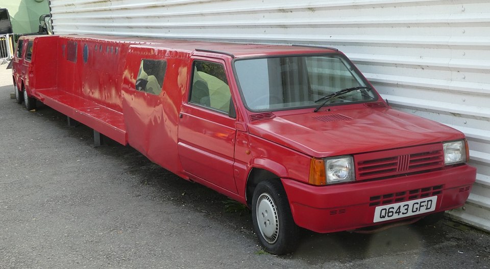 Red Fiat Panda limousine.