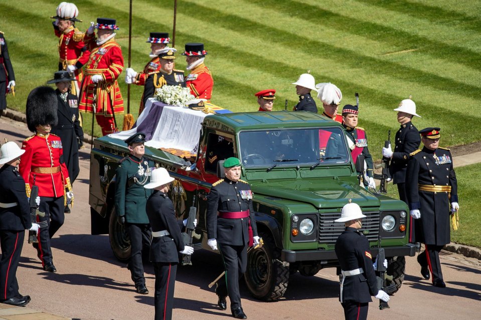 Funeral procession of Prince Philip at Windsor Castle, with his coffin on a Land Rover hearse.