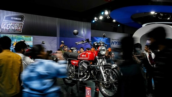 Not only cars but motorbikes by brands such as Yamaha also drew the attention of the crowd.  (Photo by Money SHARMA / AFP)(AFP)